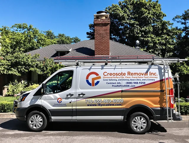 Manhattan Beach Chimney Sweep technician removing creosote safely in Manhattan Beach, CA